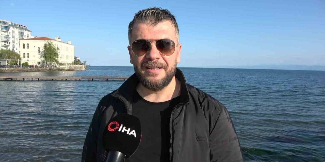 Denize Düşen Telefonunu Kurtarmak İçin Bacaklarından Sarkıttı
