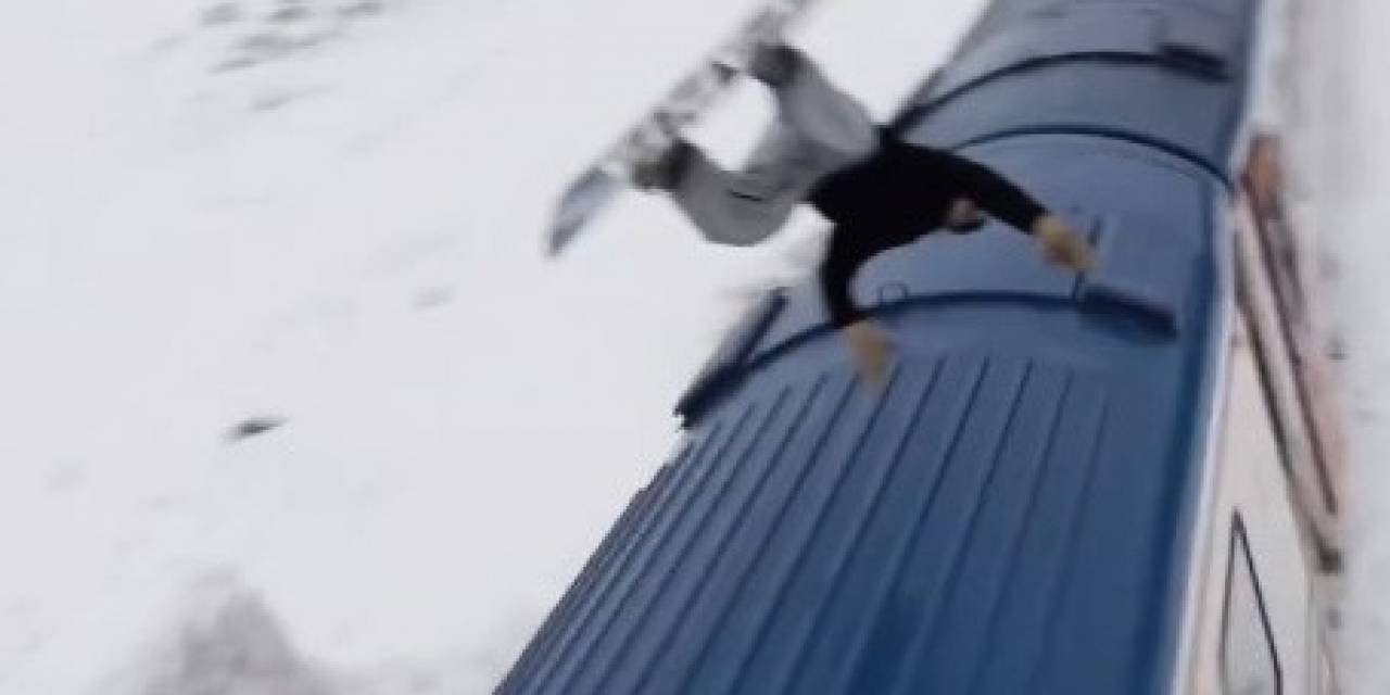 Snowboardla Doğu Ekspresi’nin Üzerinden Atladı