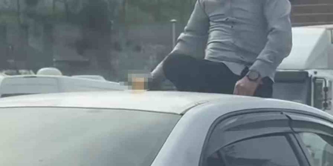 Canını Hiçe Sayarak Otomobilin Üzerinde Alkol Tüketen Şahsın Keyfi Pes Dedirtti