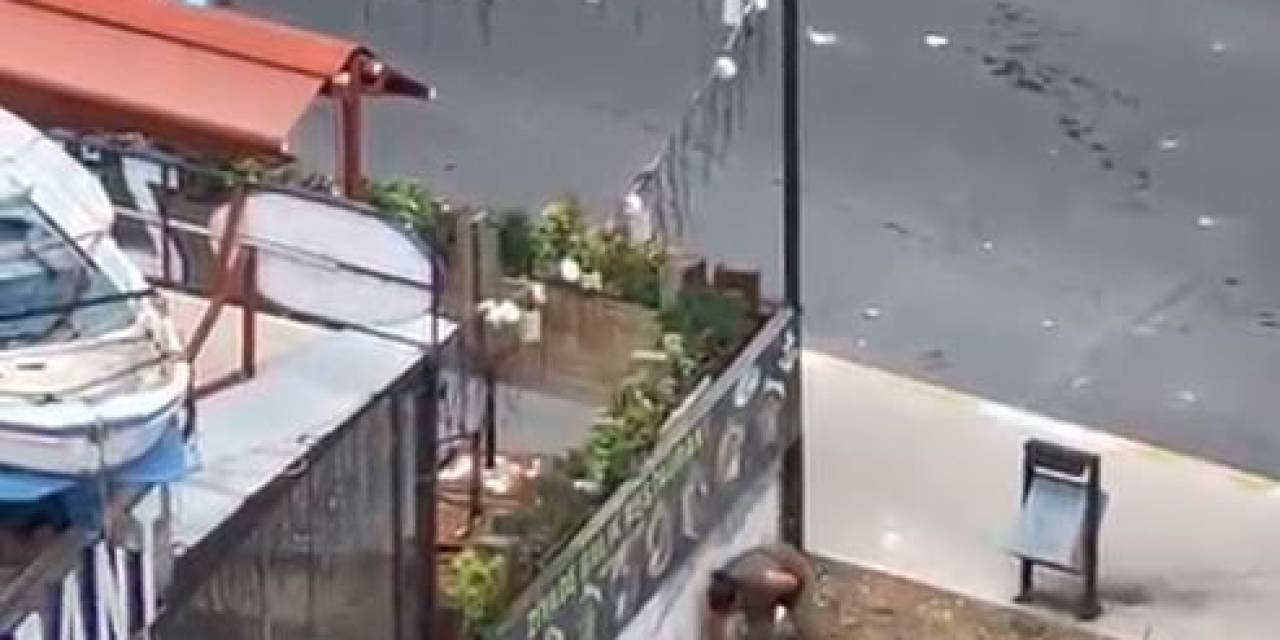 Esenyurt’ta Bir Kadın Yoldan Geçen Araçlara Taşla Saldırdı