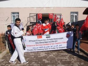 Dünya Tekvando Federasyonu, Konteyner Kentine Malzeme Dağıttı