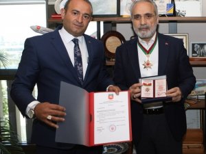 Cumhurbaşkanı Başdanışmanı Topçu’ya ‘Üstün Hizmet Nişanı’