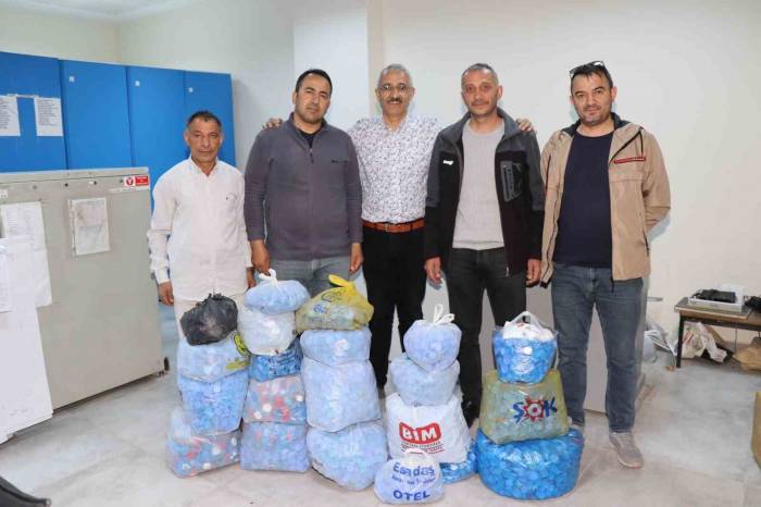 Oltu Kadastro Personeli Binlerce Mavi Kapak Topladı